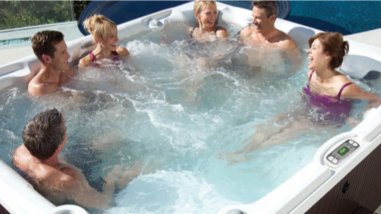 a group of people in a hot tub