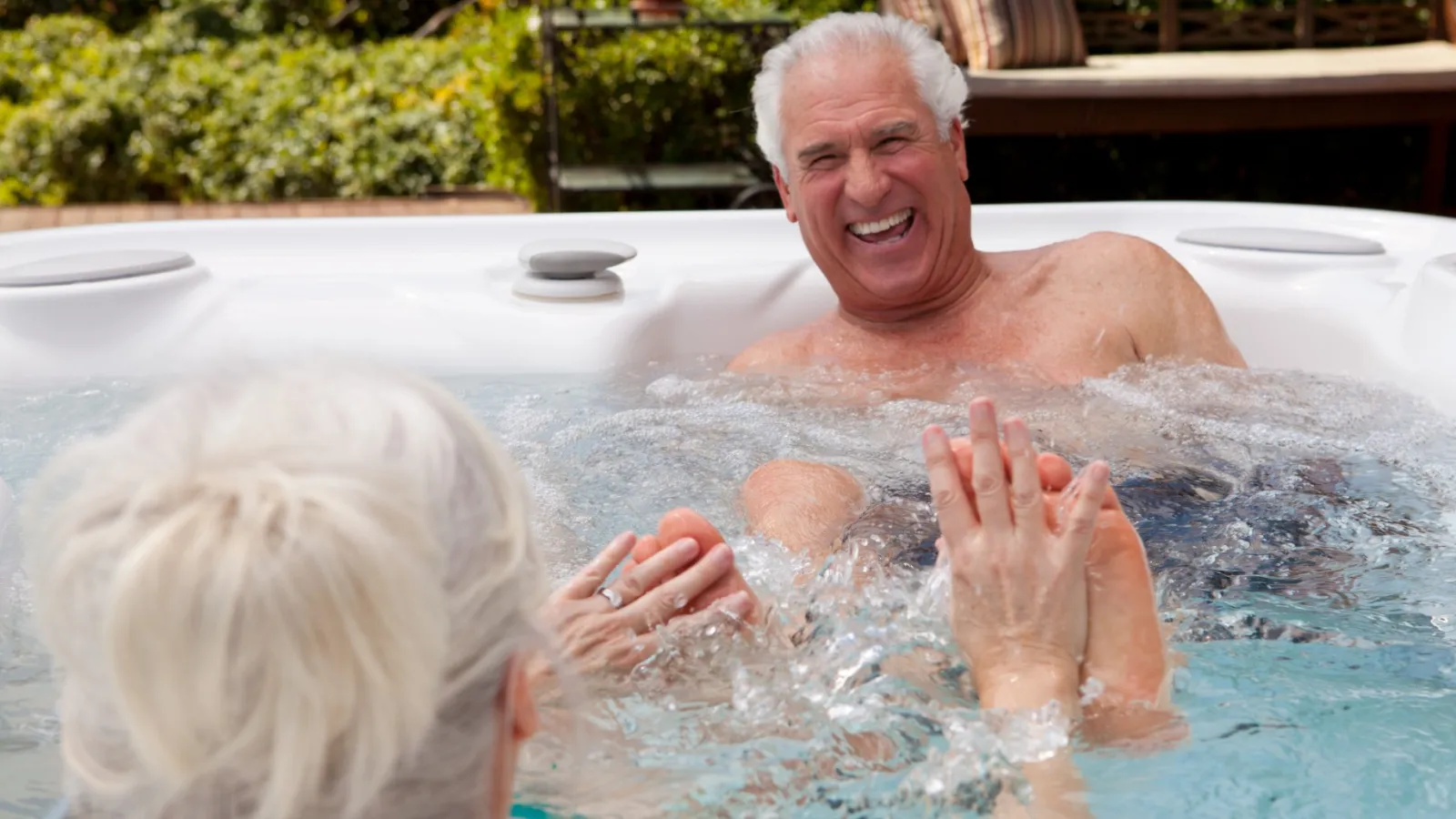 a man and a woman in a pool