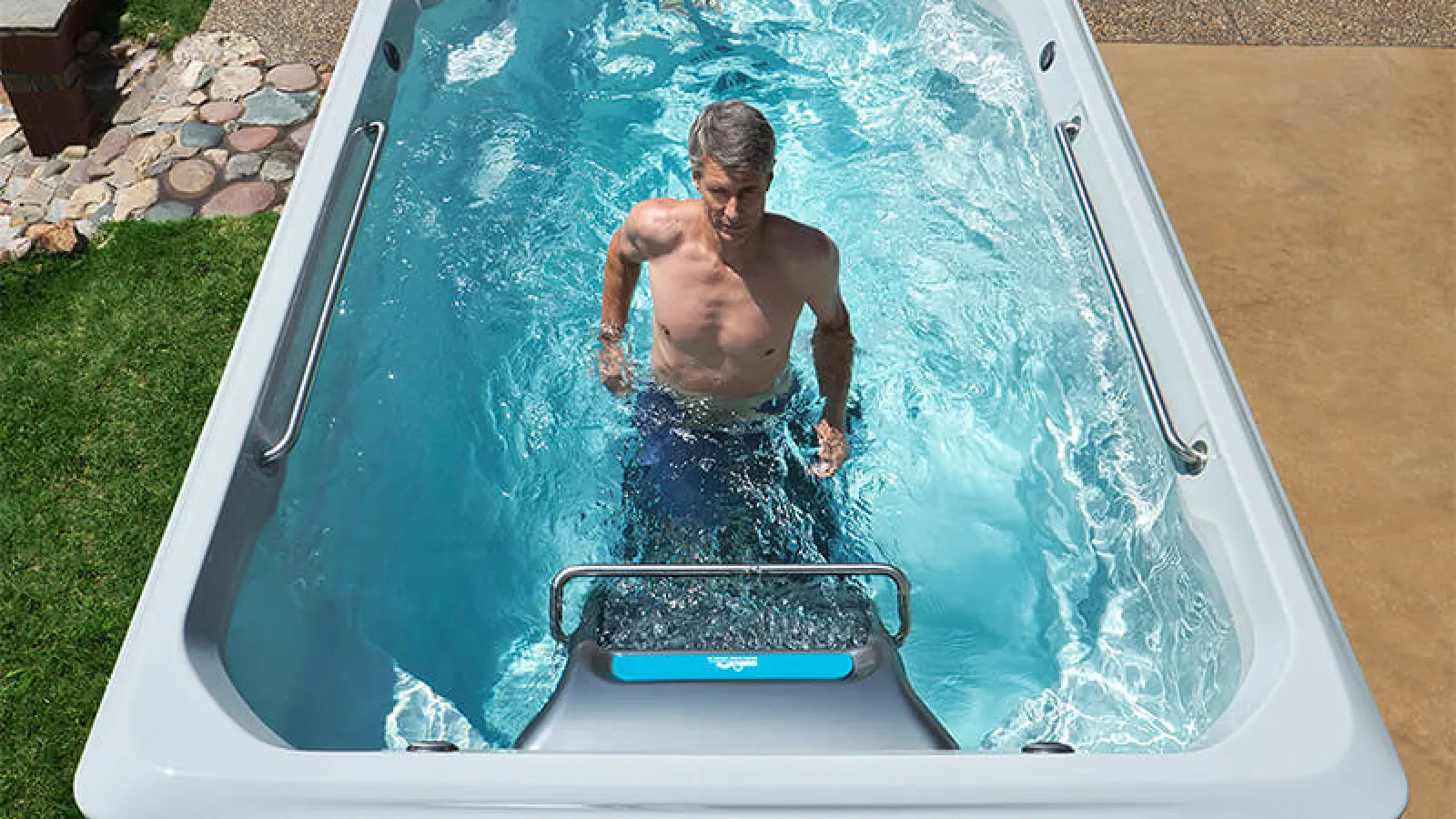 a man in a swim spa