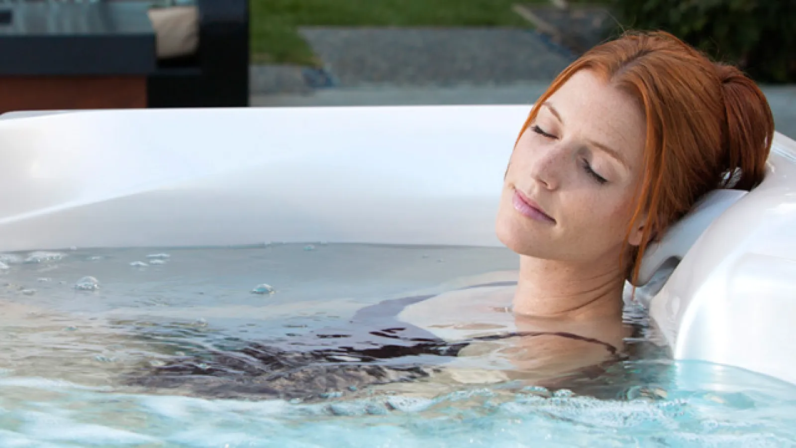 a woman in a hot tub