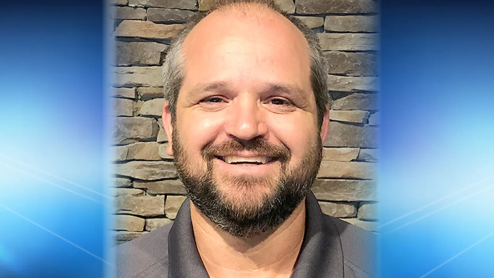 a man smiling for the camera