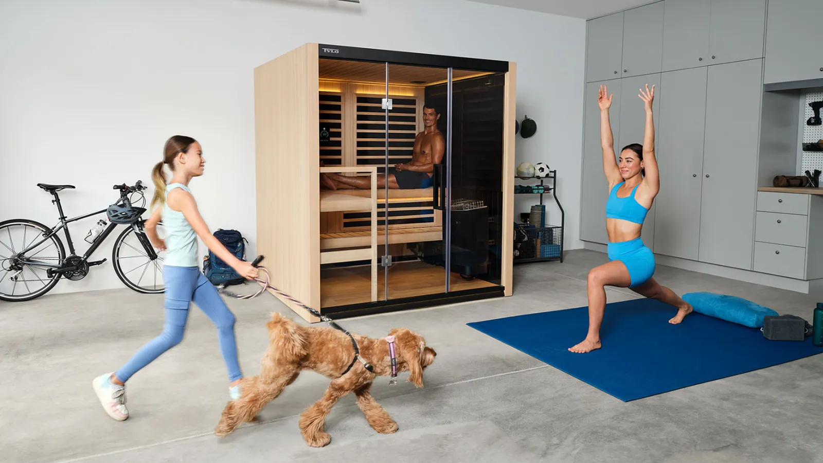 people in a garage with a sauna