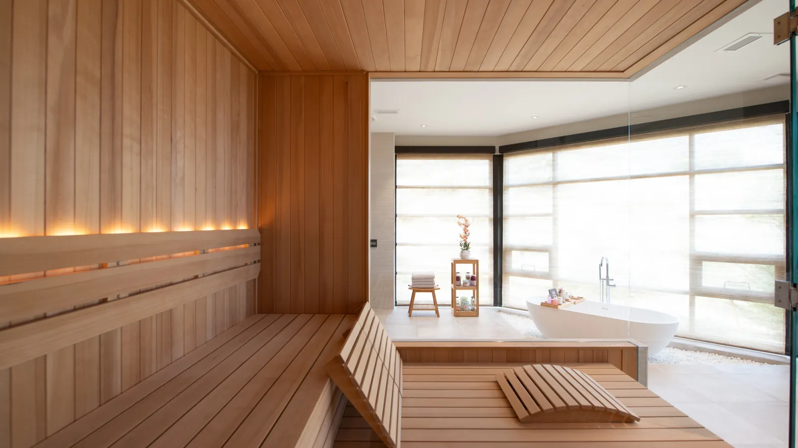 a bathroom with a tub and a sink