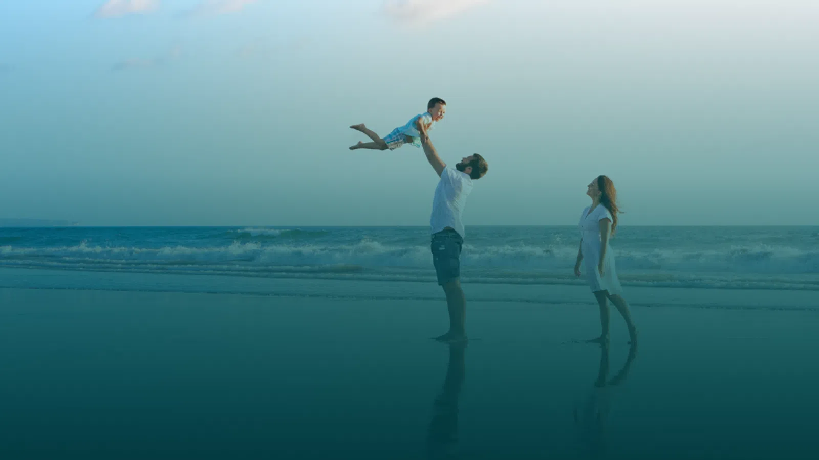 a group of people on a beach