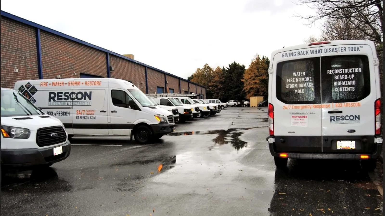a group of cars parked in a parking lot