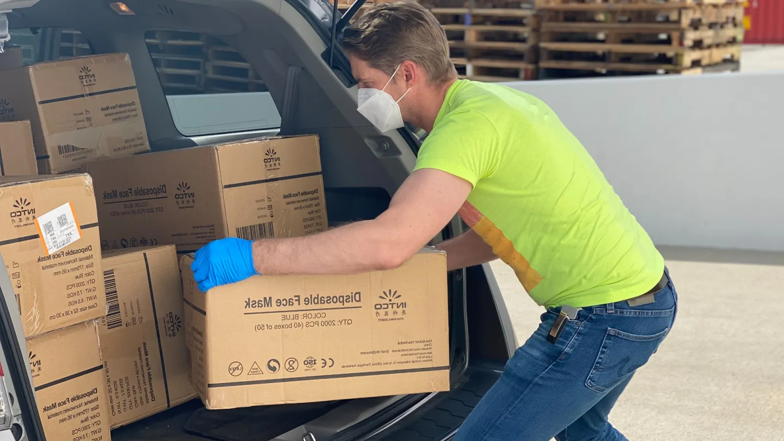 a person opening a box