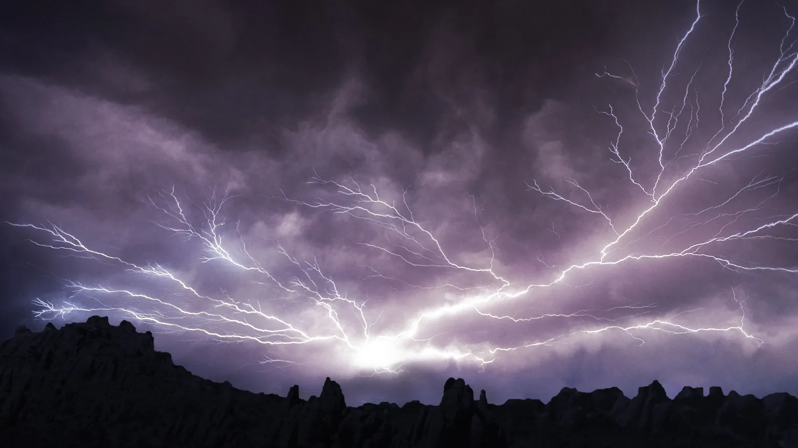 lightning striking a mountain
