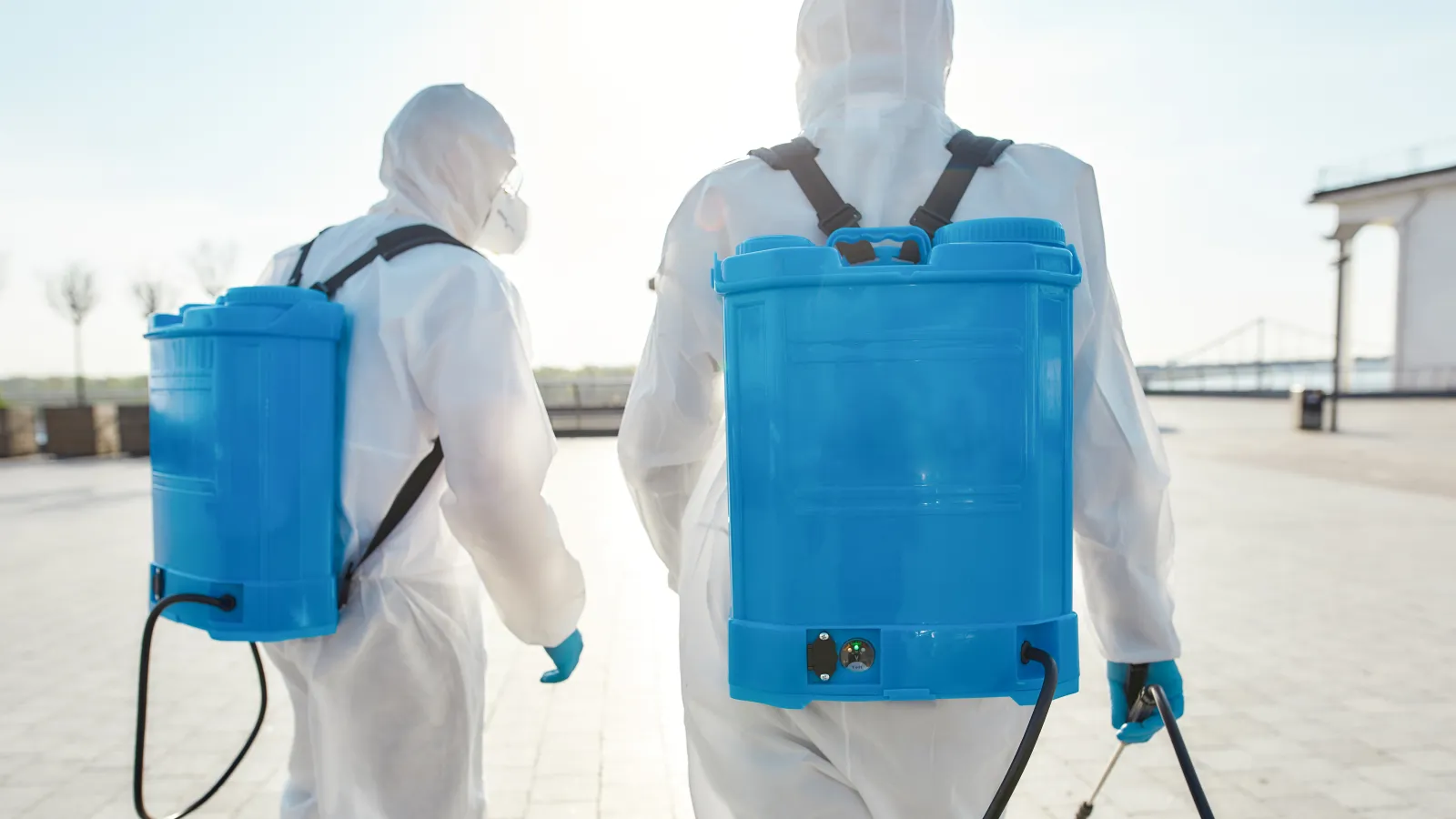 a few people carrying bags