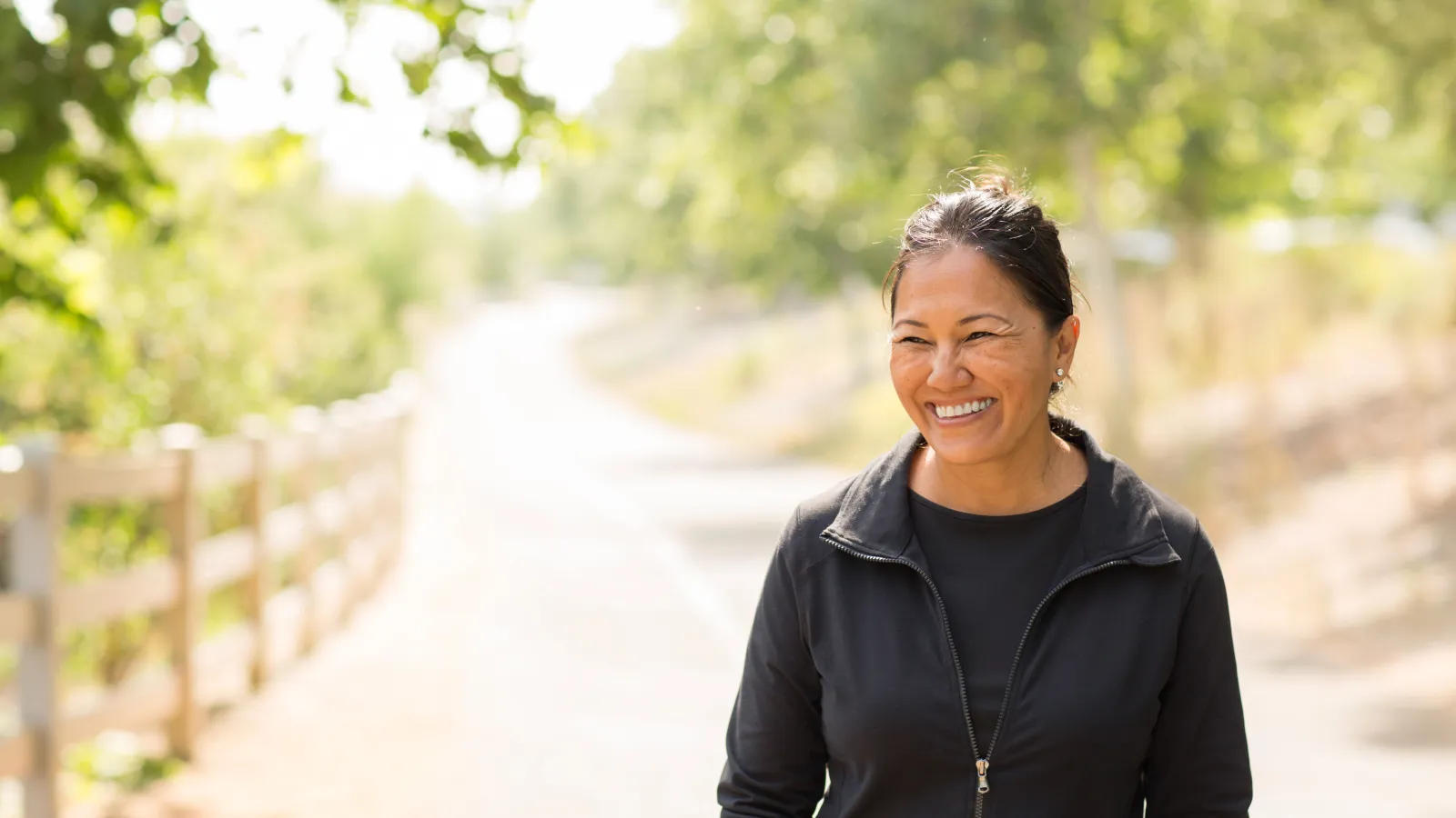 a person smiling outside