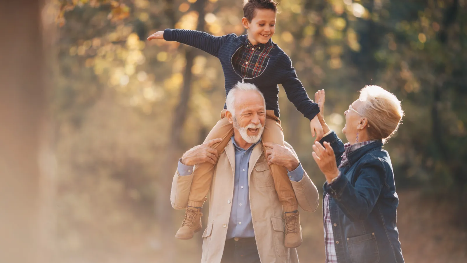 grandparents playing with their grandchild