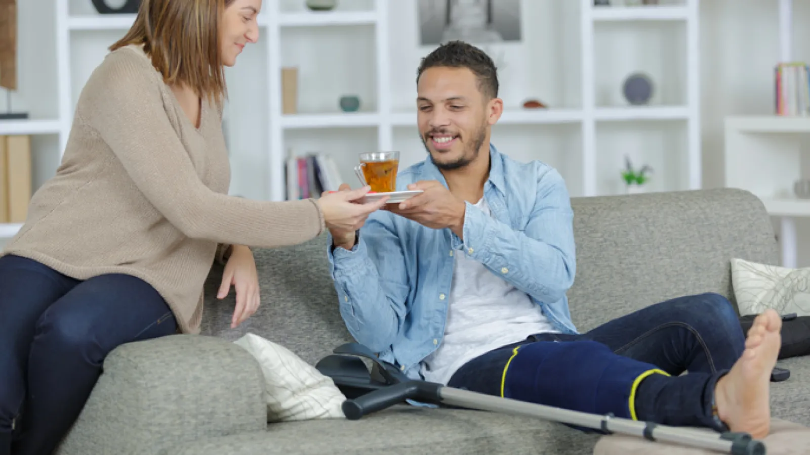 a man and a woman sitting on a couch