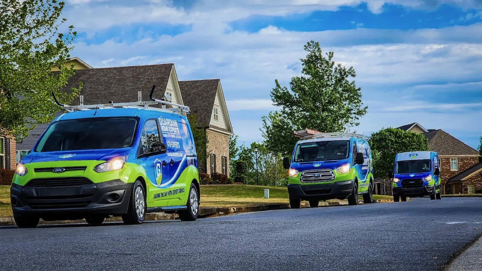 Guardian Home Experts van in a Kennesaw, Ga neighborhood