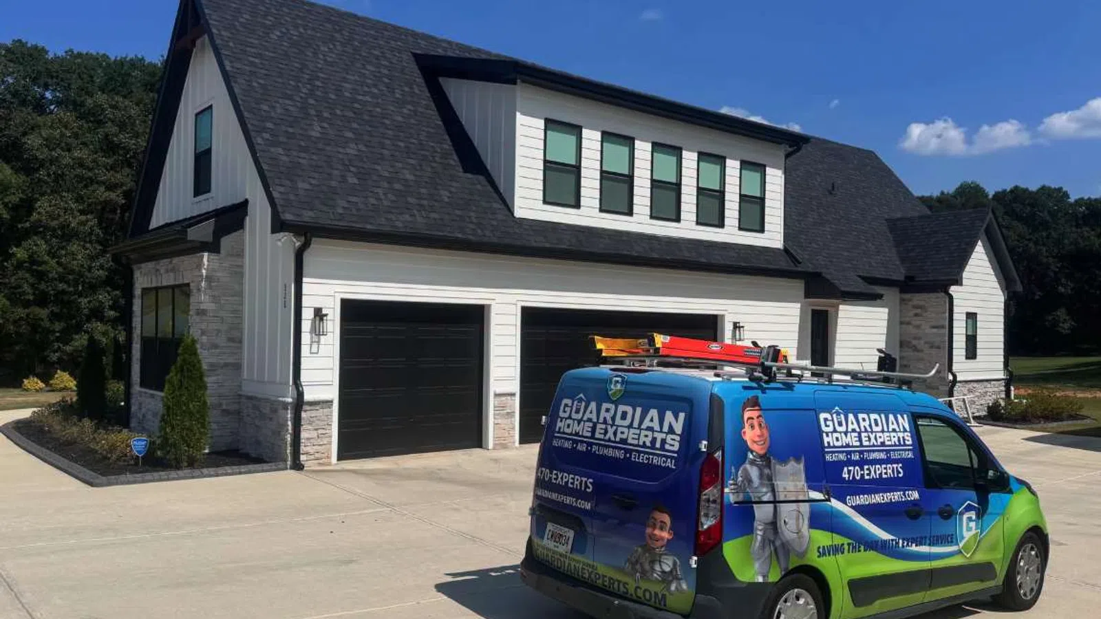 Guardian Home Experts service van parked in front of a Cartersville house for furnace maintenance