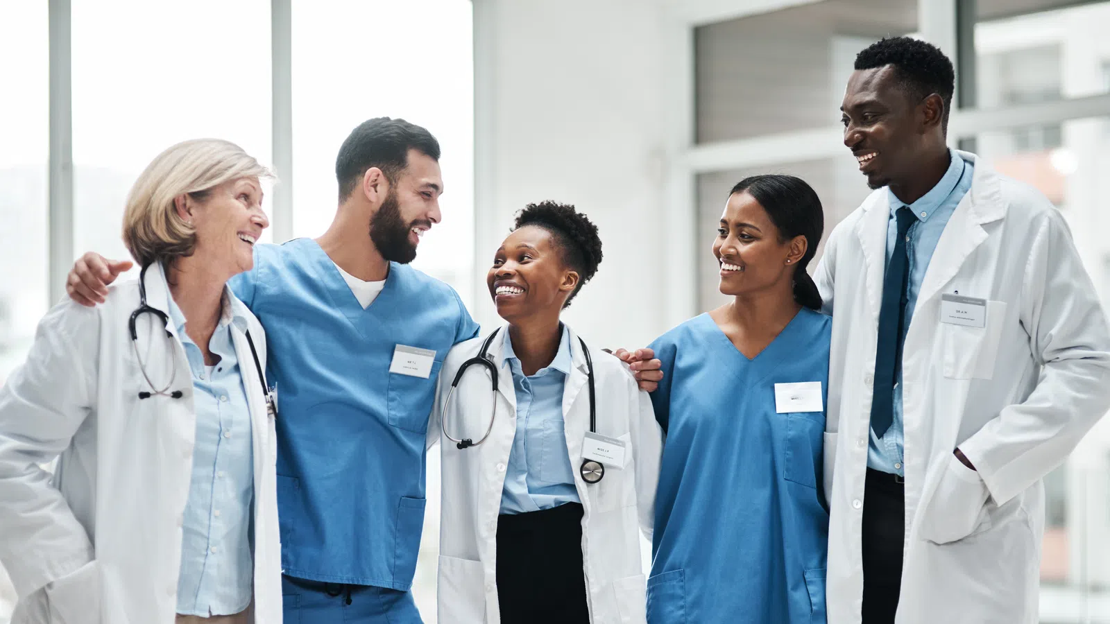 a group of people in lab coats