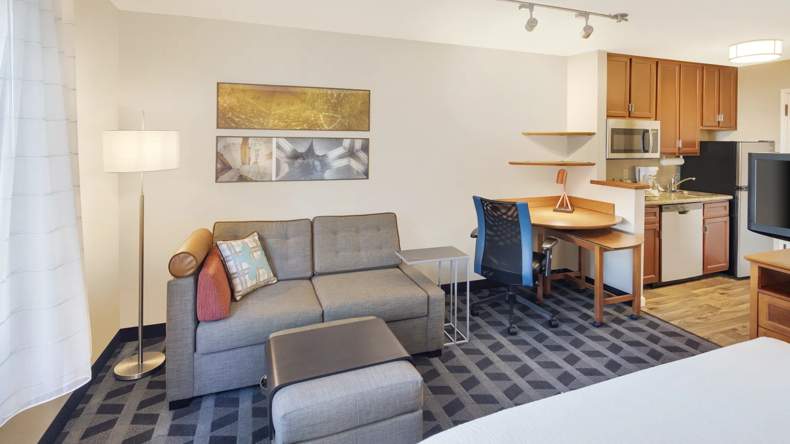 a living room with a couch and a table