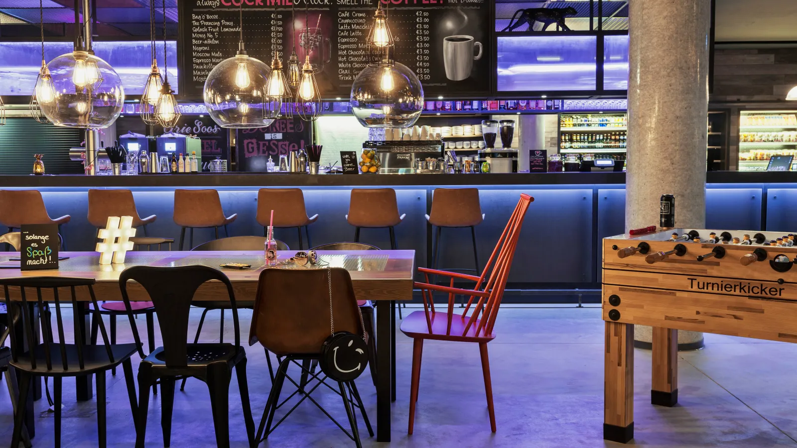 a bar with a bar and chairs