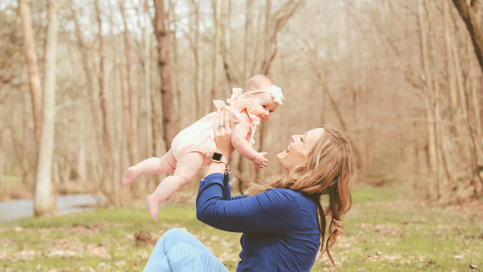 a person holding a baby