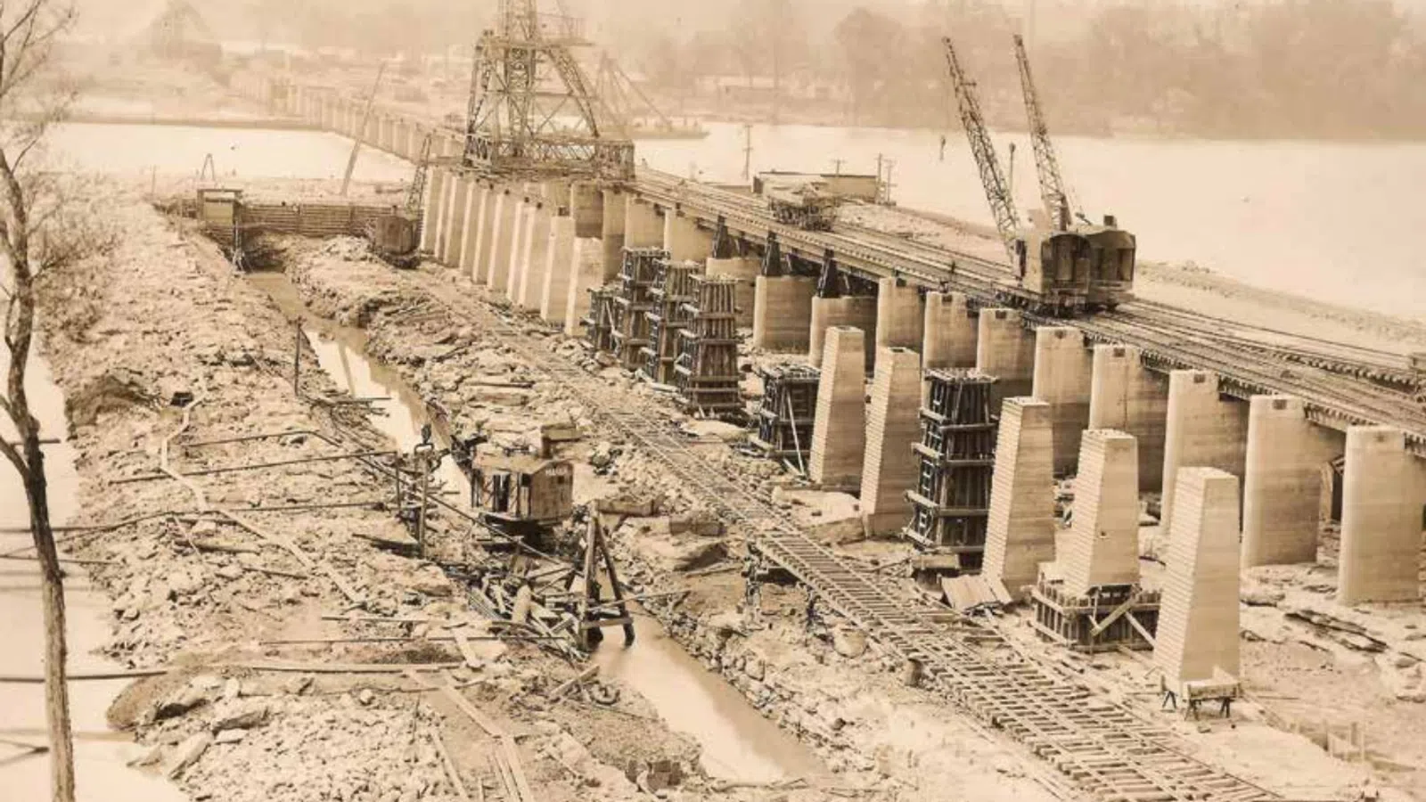 a large building with cranes