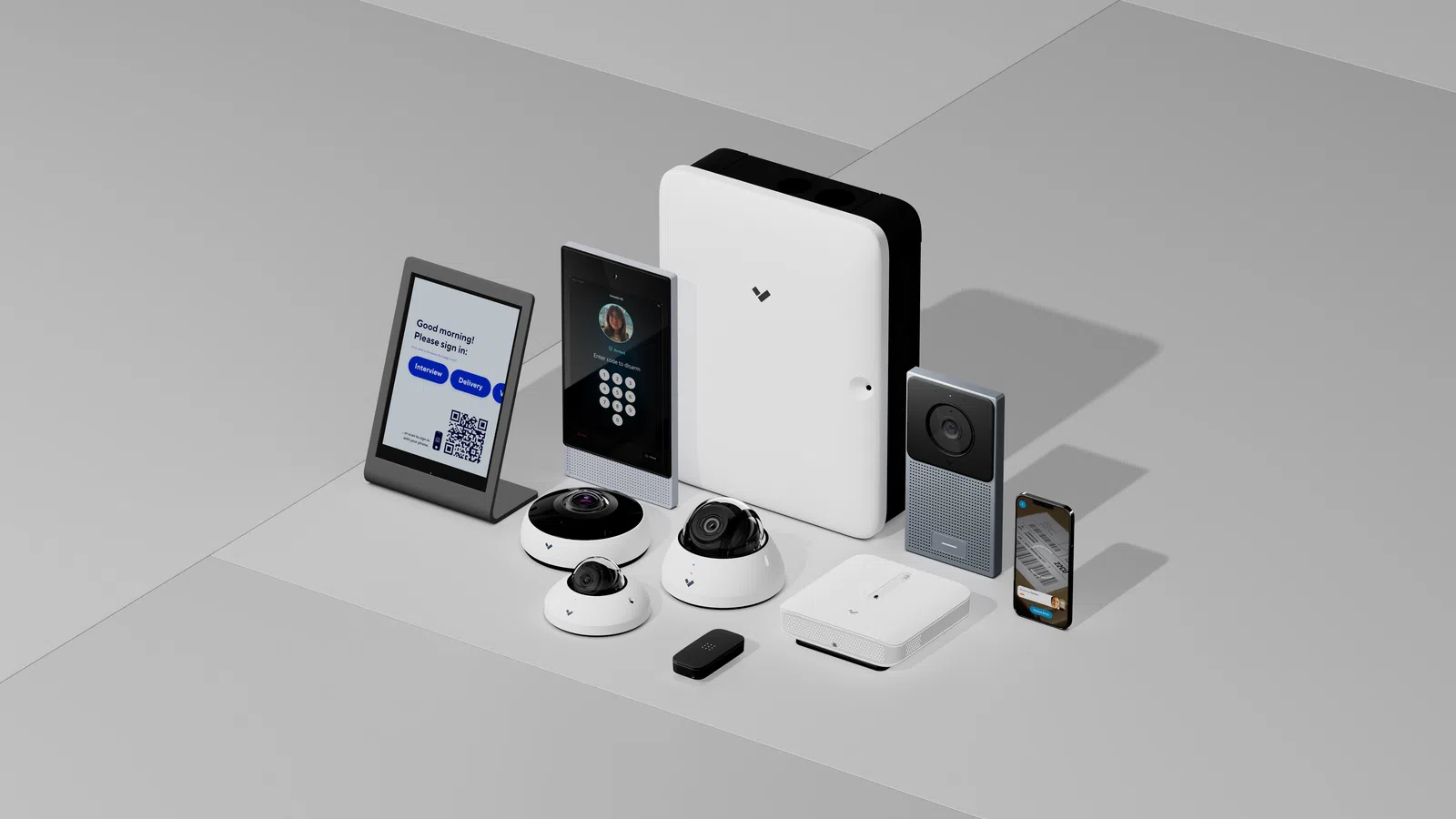 a white table with a white wall and a white wall with a black device and a white rectangular