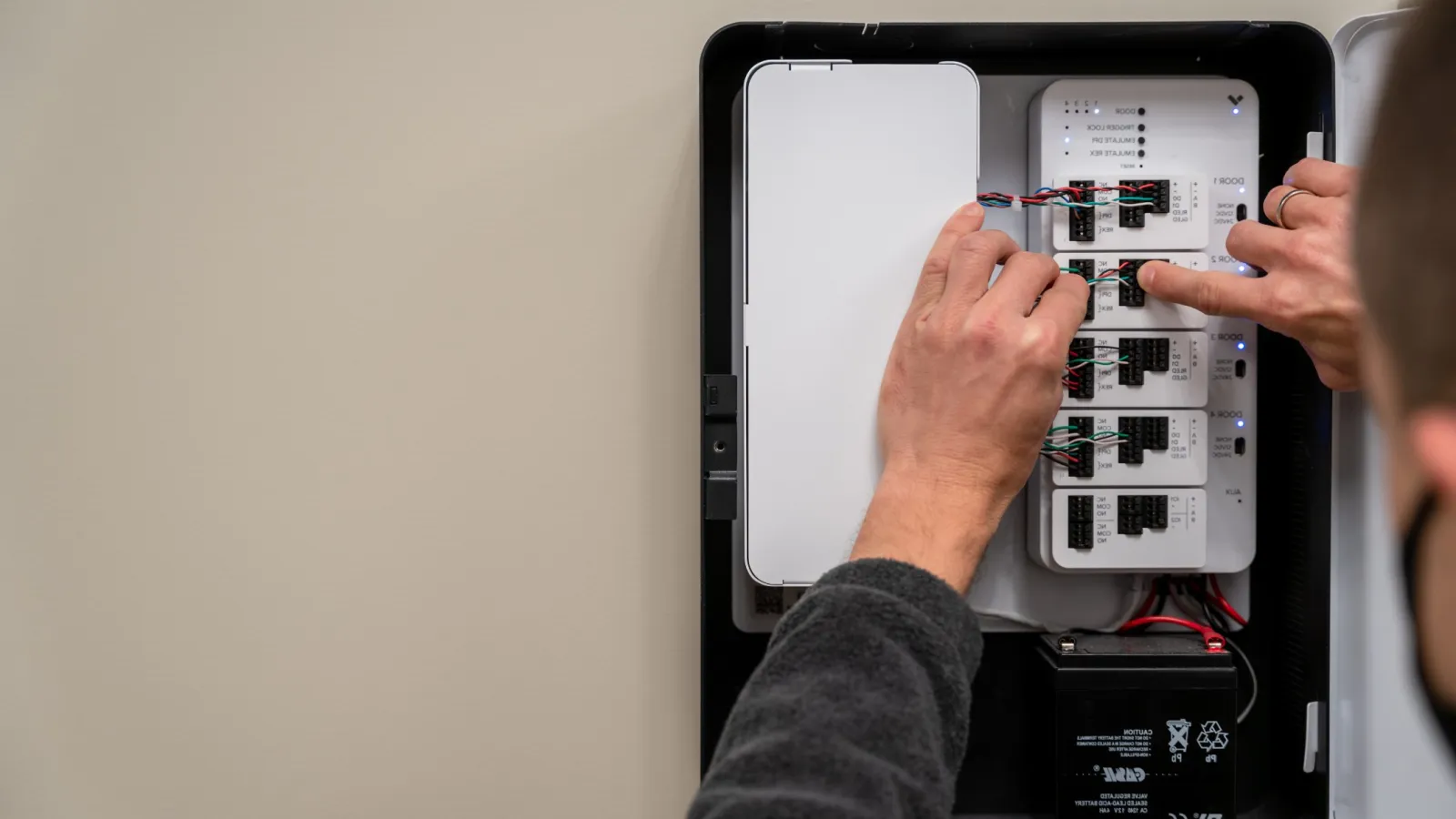 a person holding a computer