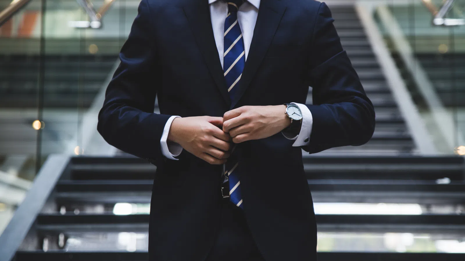 a person wearing a suit and tie
