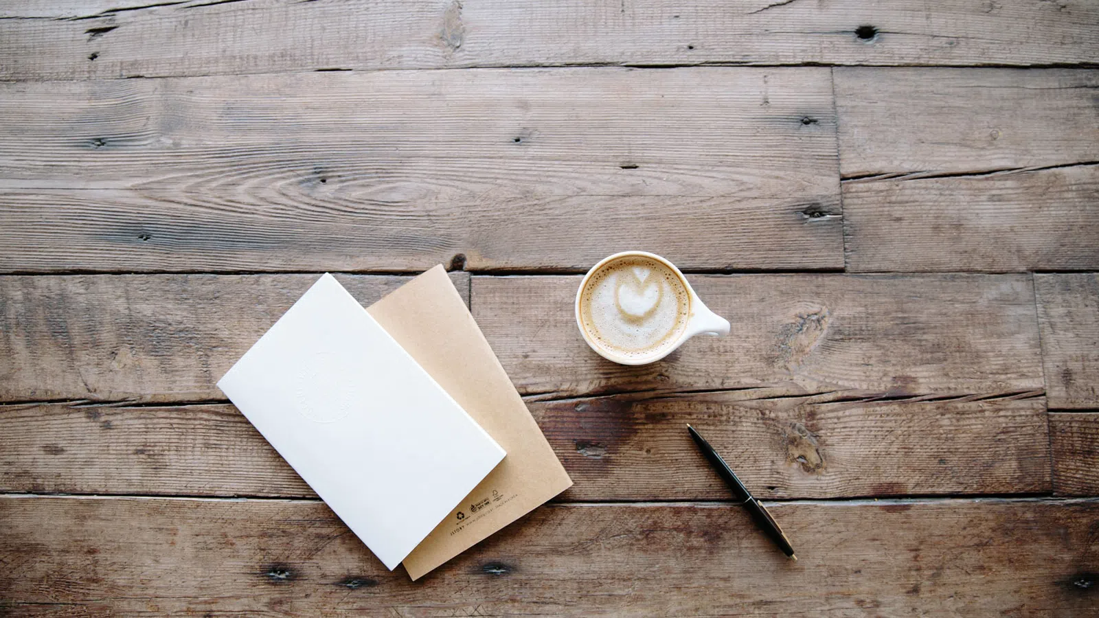 a piece of paper on a wooden surface
