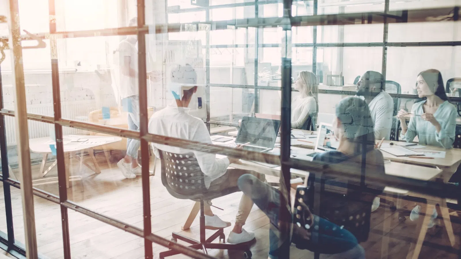 people sitting in a meeting
