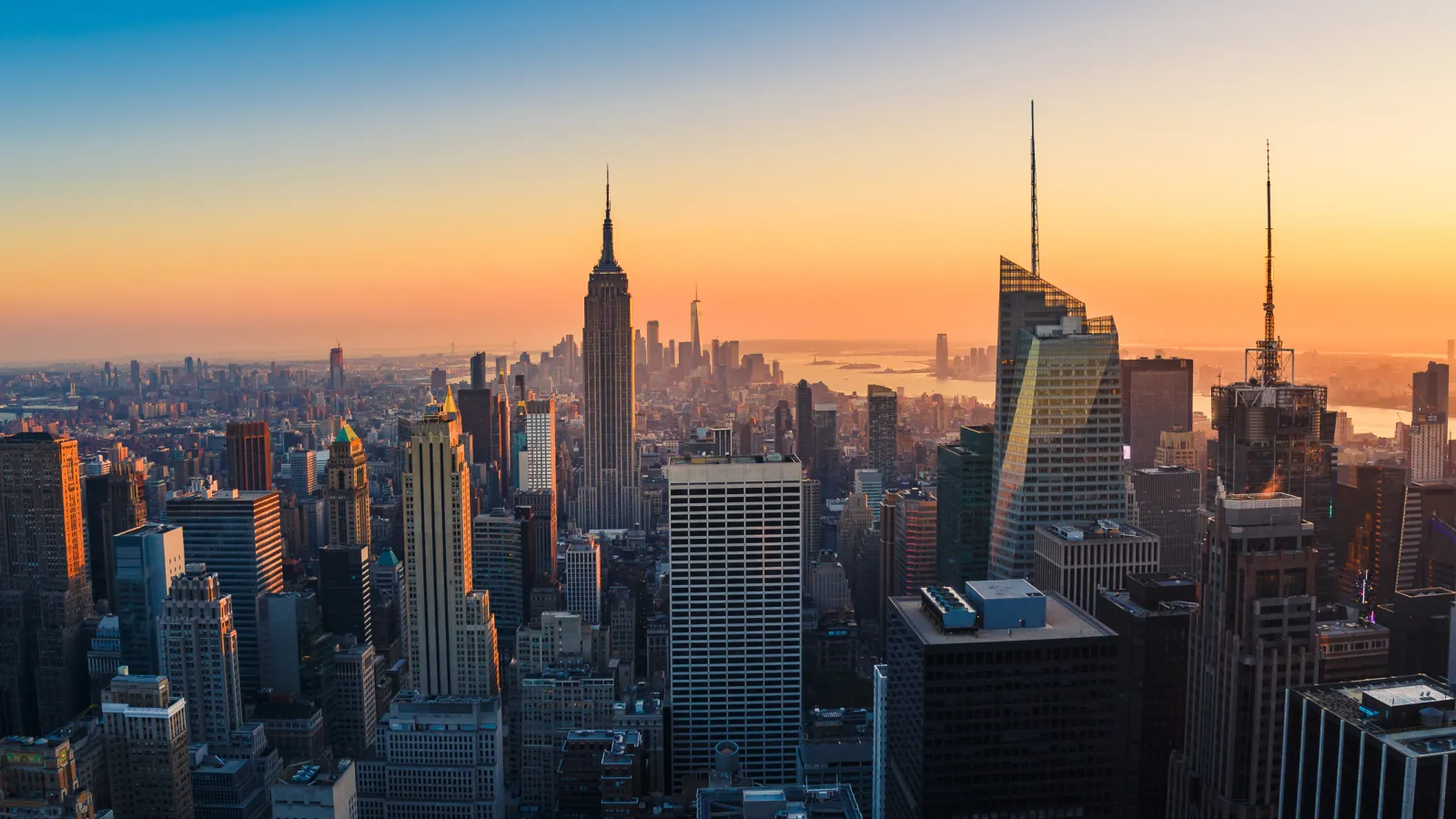 a city skyline at sunset