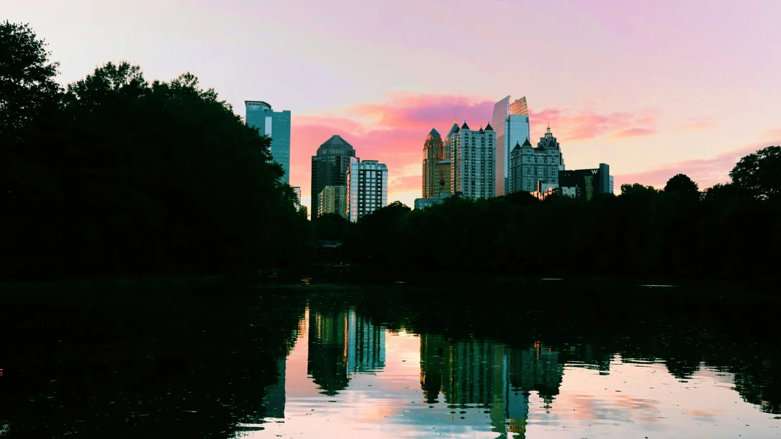 a city skyline at sunset