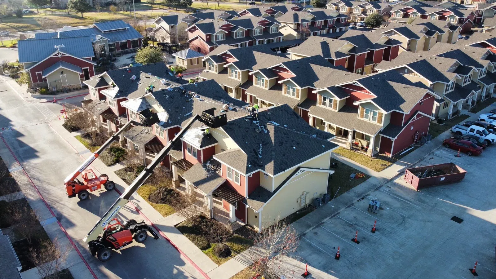 Aerial view of a multi-family apartment community roofed by Mattco in Texas