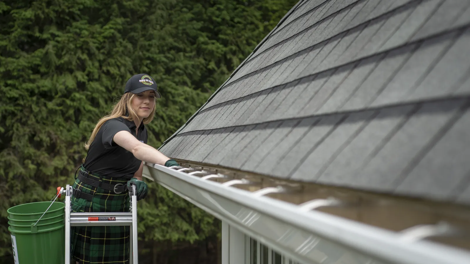 a person standing next to a roof