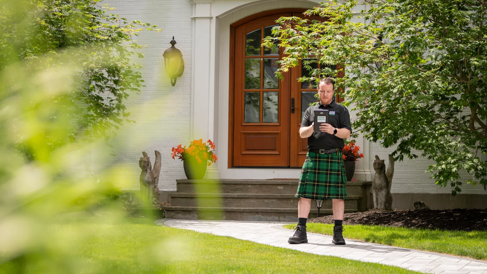 a person standing outside a house