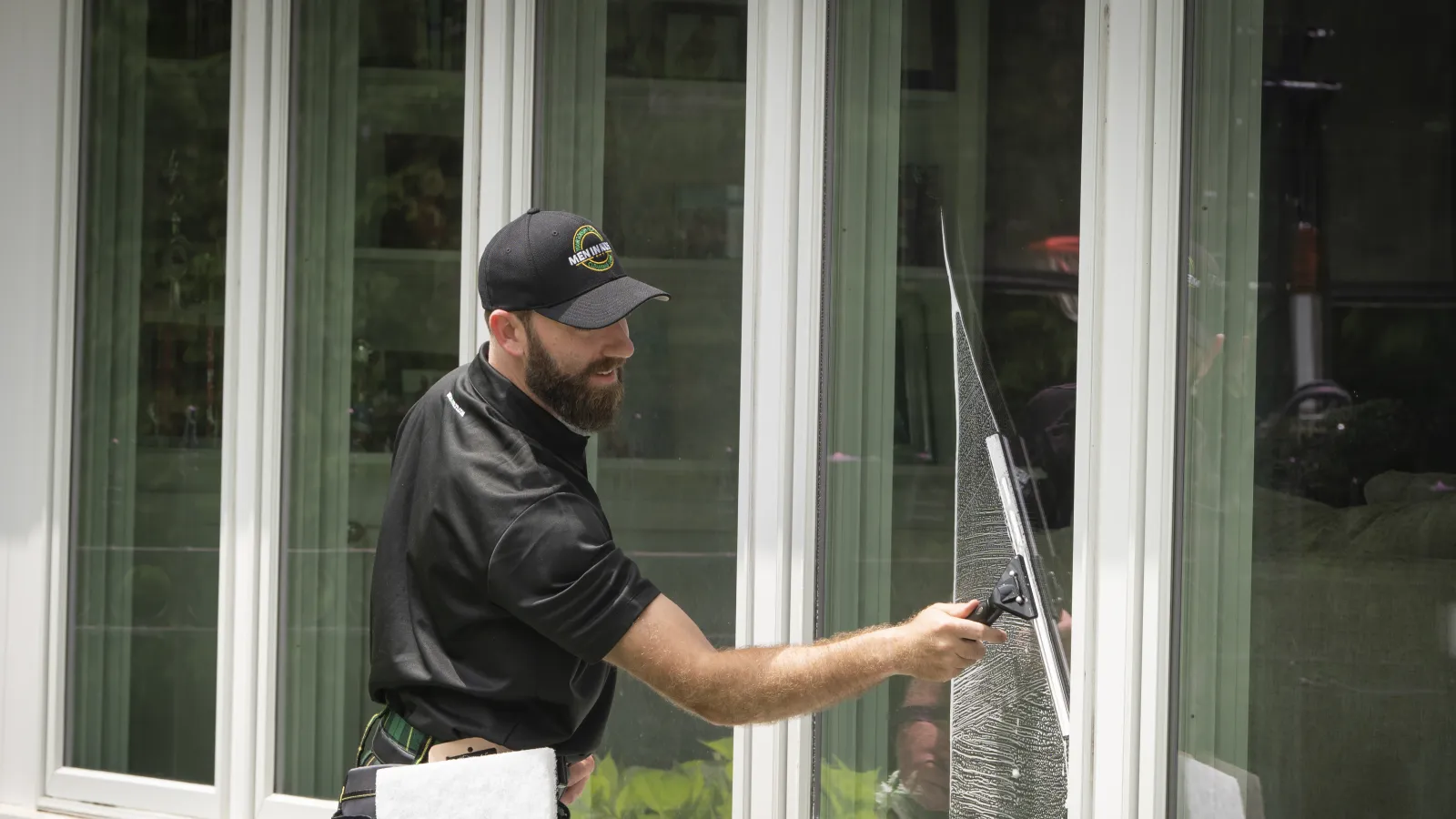 a man cleaning a window