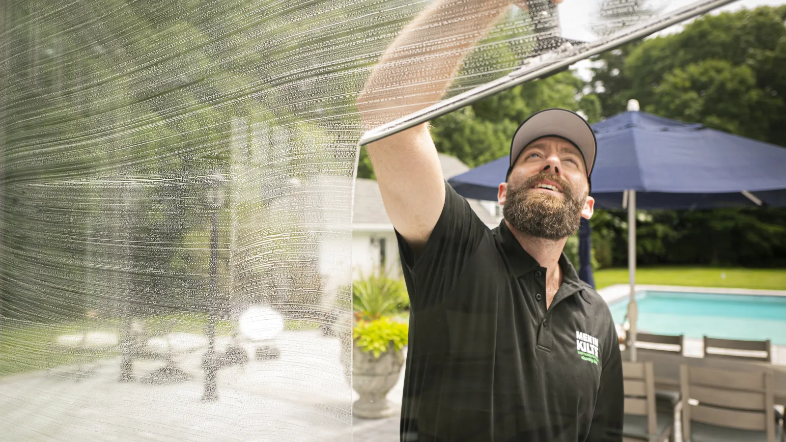 a man washing a window