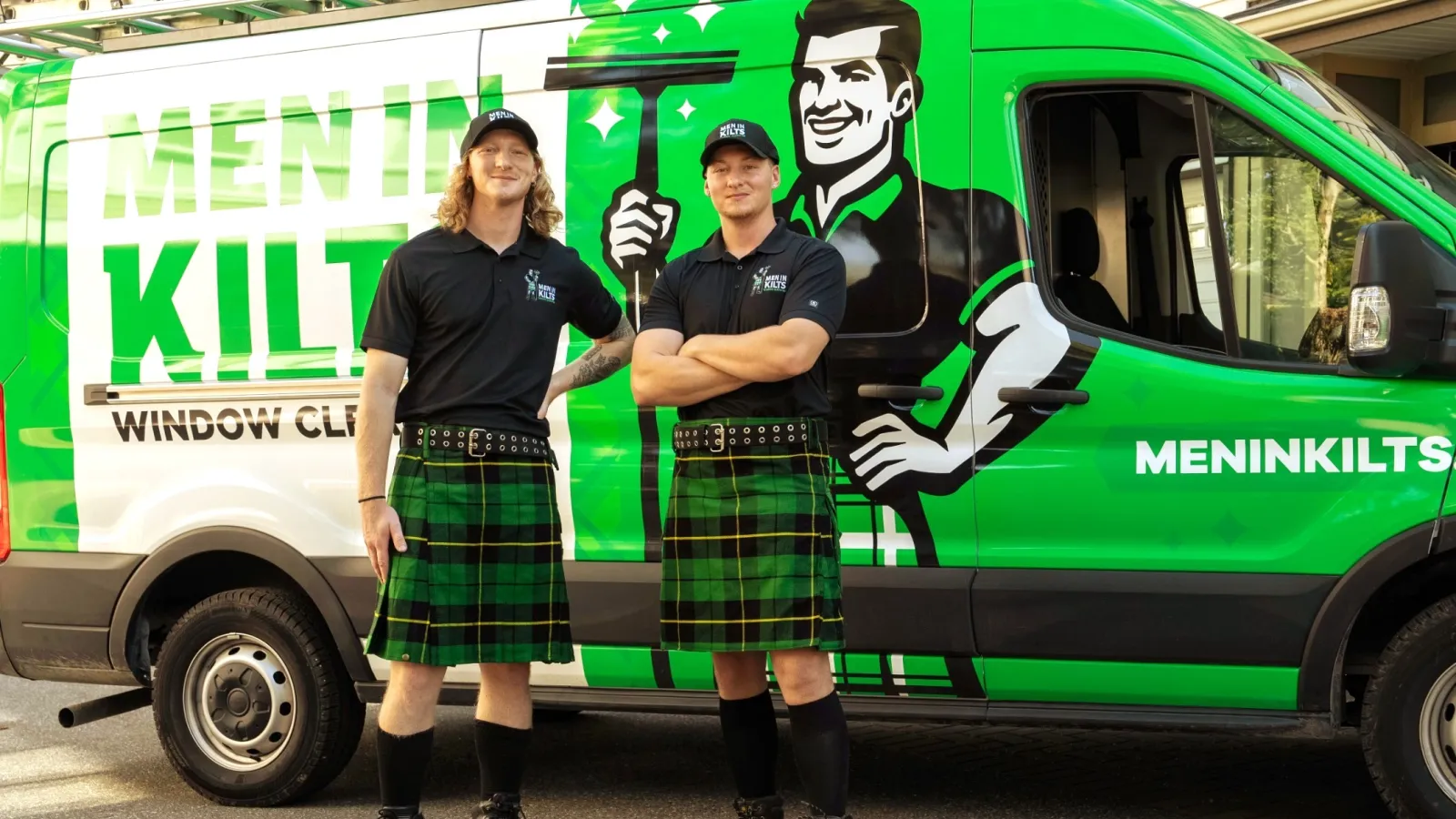 a man and woman in kilts