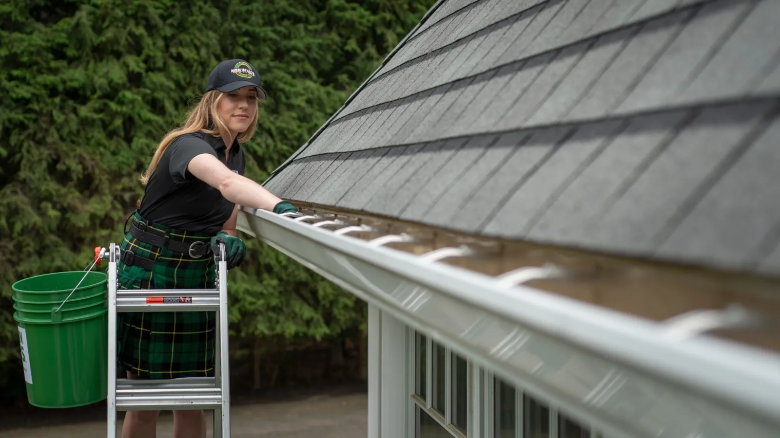 a person standing next to a roof