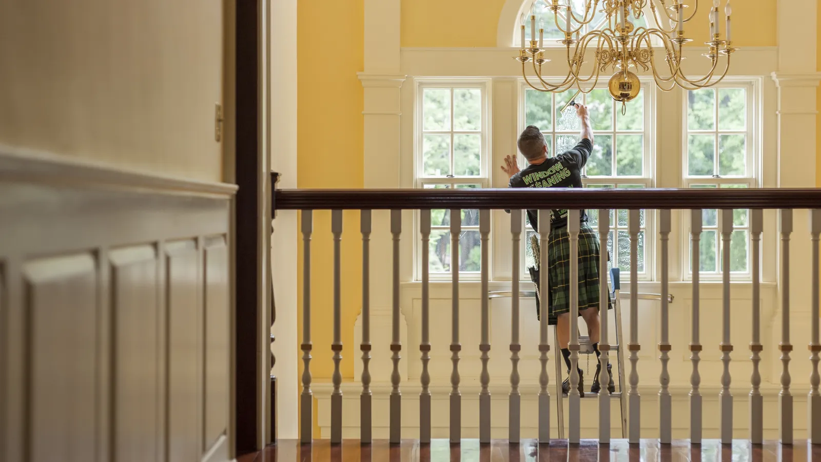 a man and a woman standing on a balcony