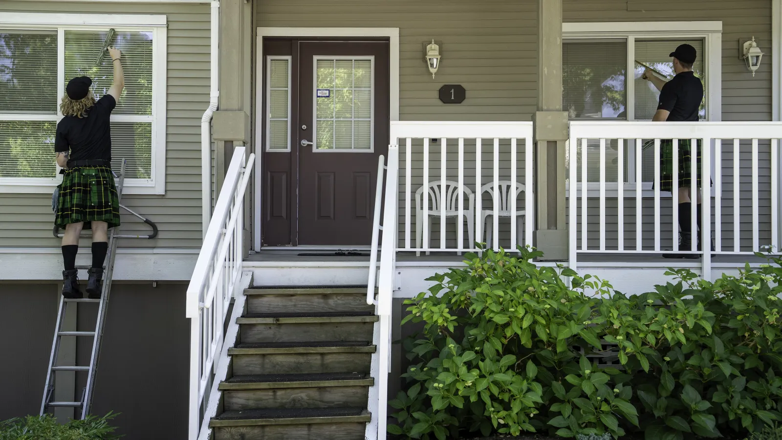 a couple of people on a porch