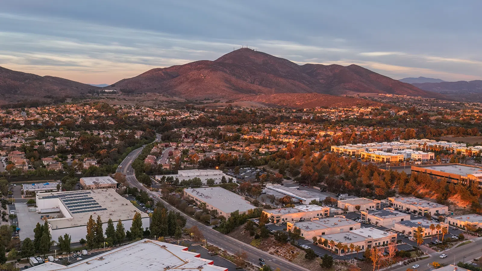 a city with mountains in the background