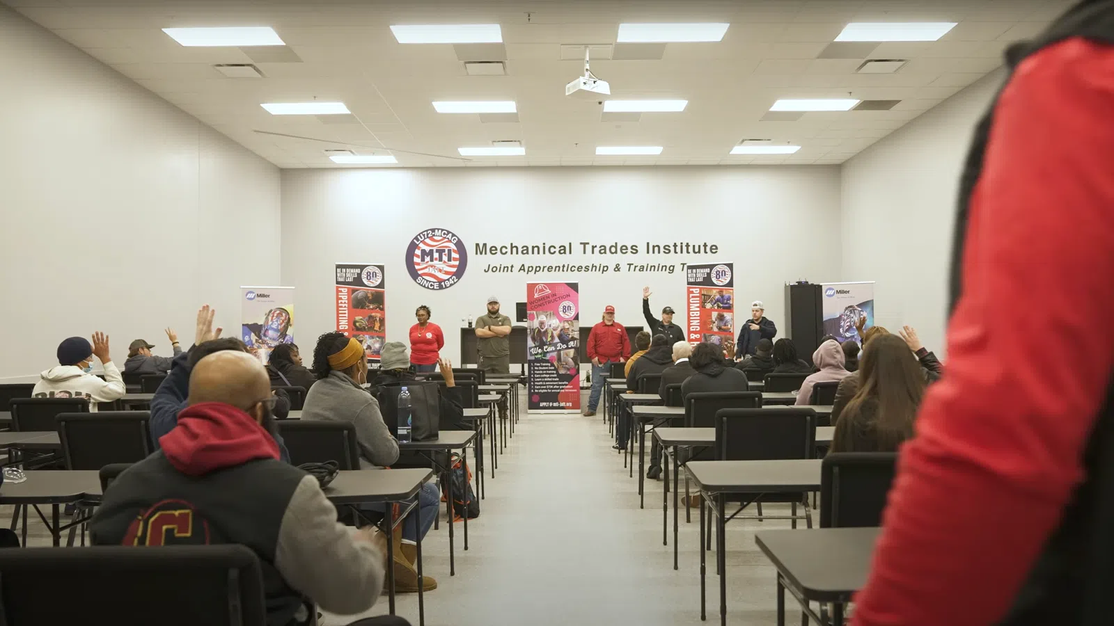 a group of people in a classroom