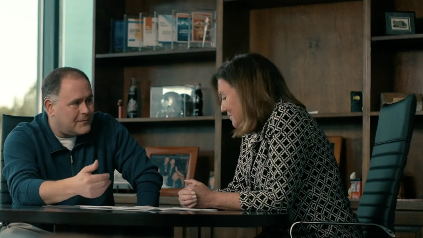 A divorce lawyer explaining how to save money.