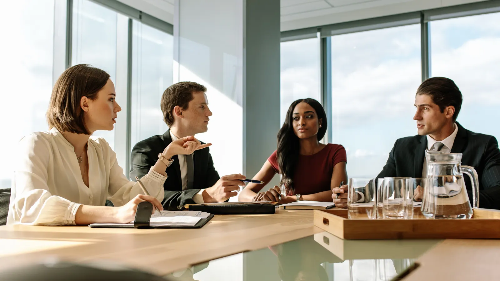 a group of people sitting at a table