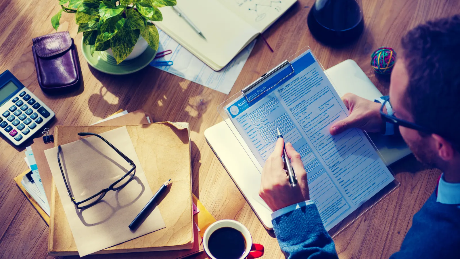 Filling out interrogatories for divorce discovery.