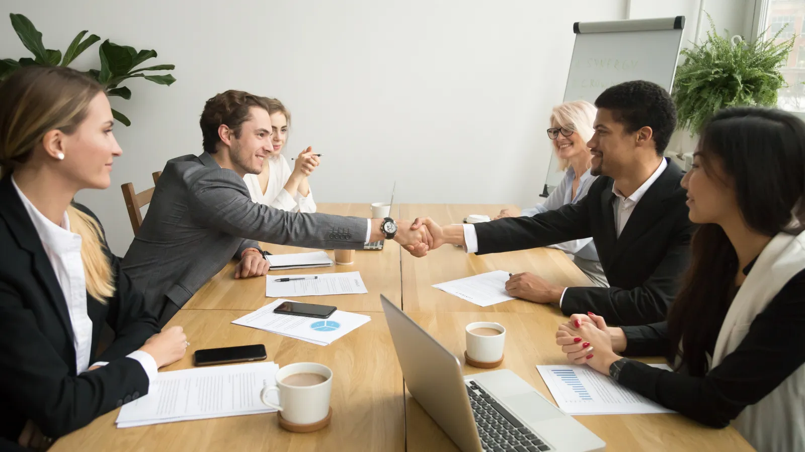 a group of people sitting at a table