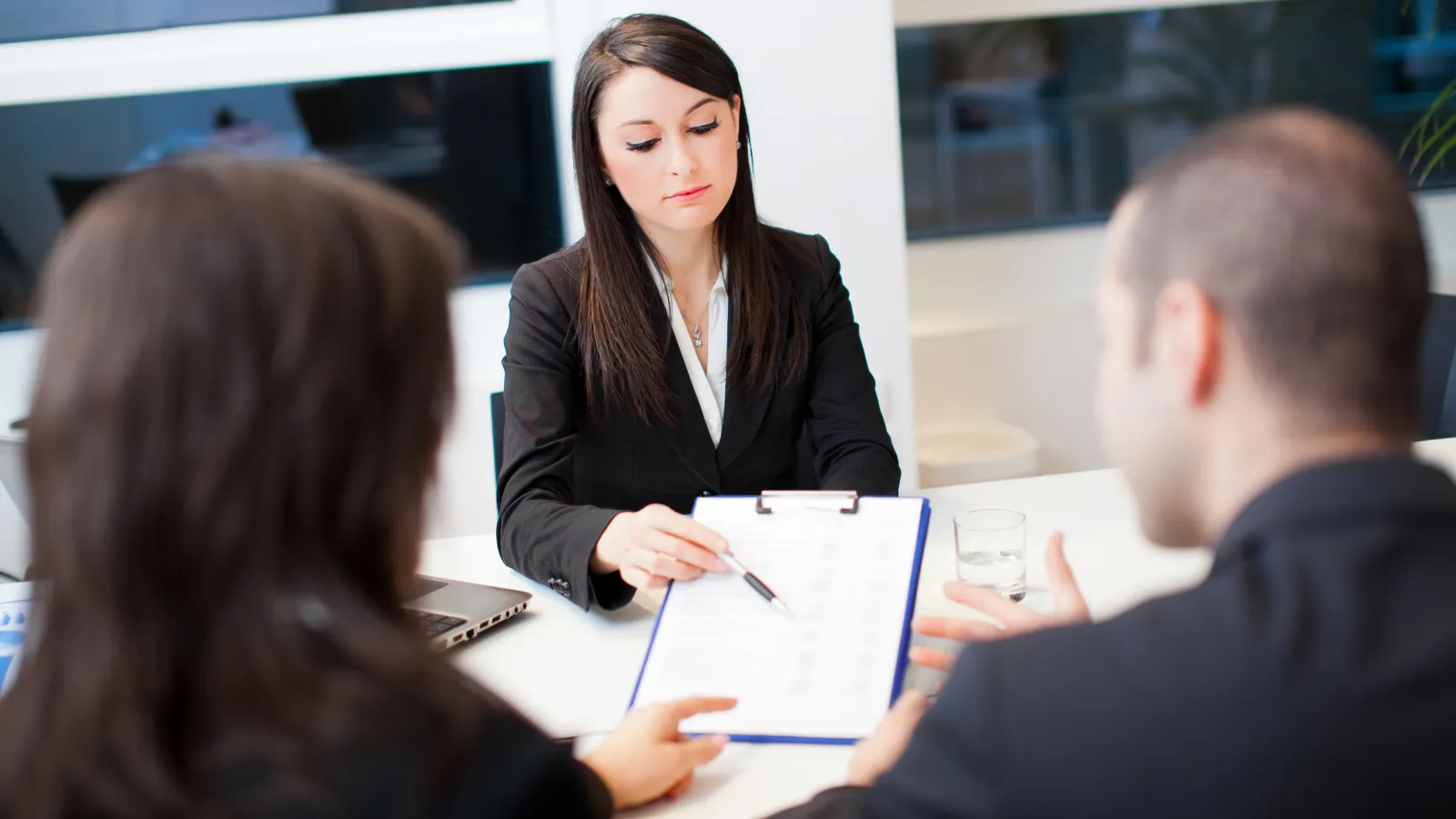 a person talking to a group of people