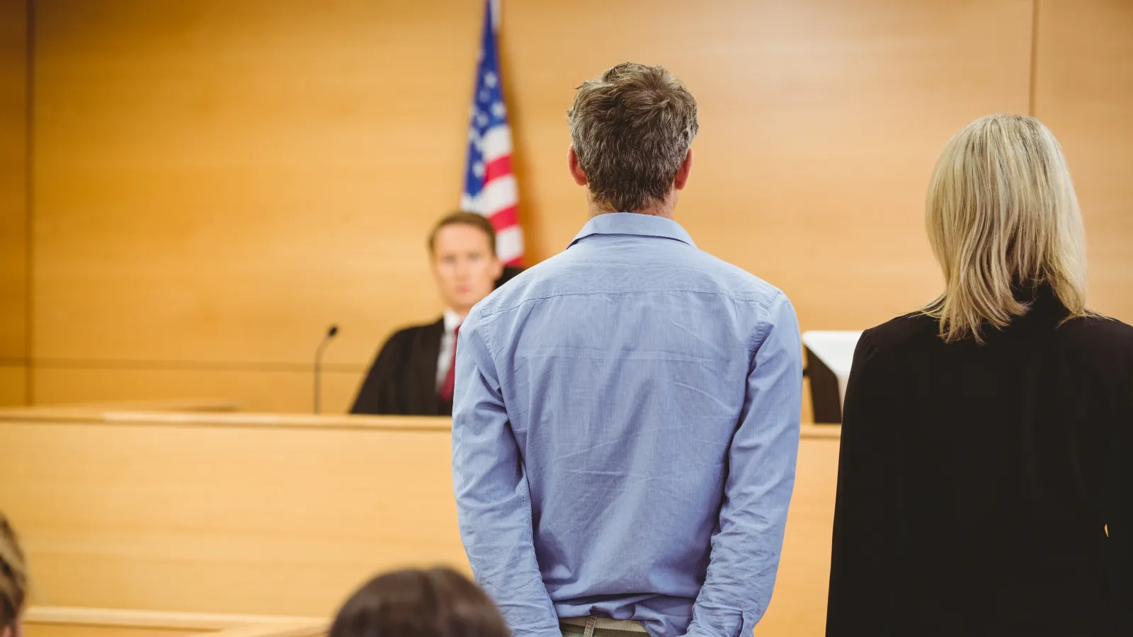 a man and a woman standing in front of a podium