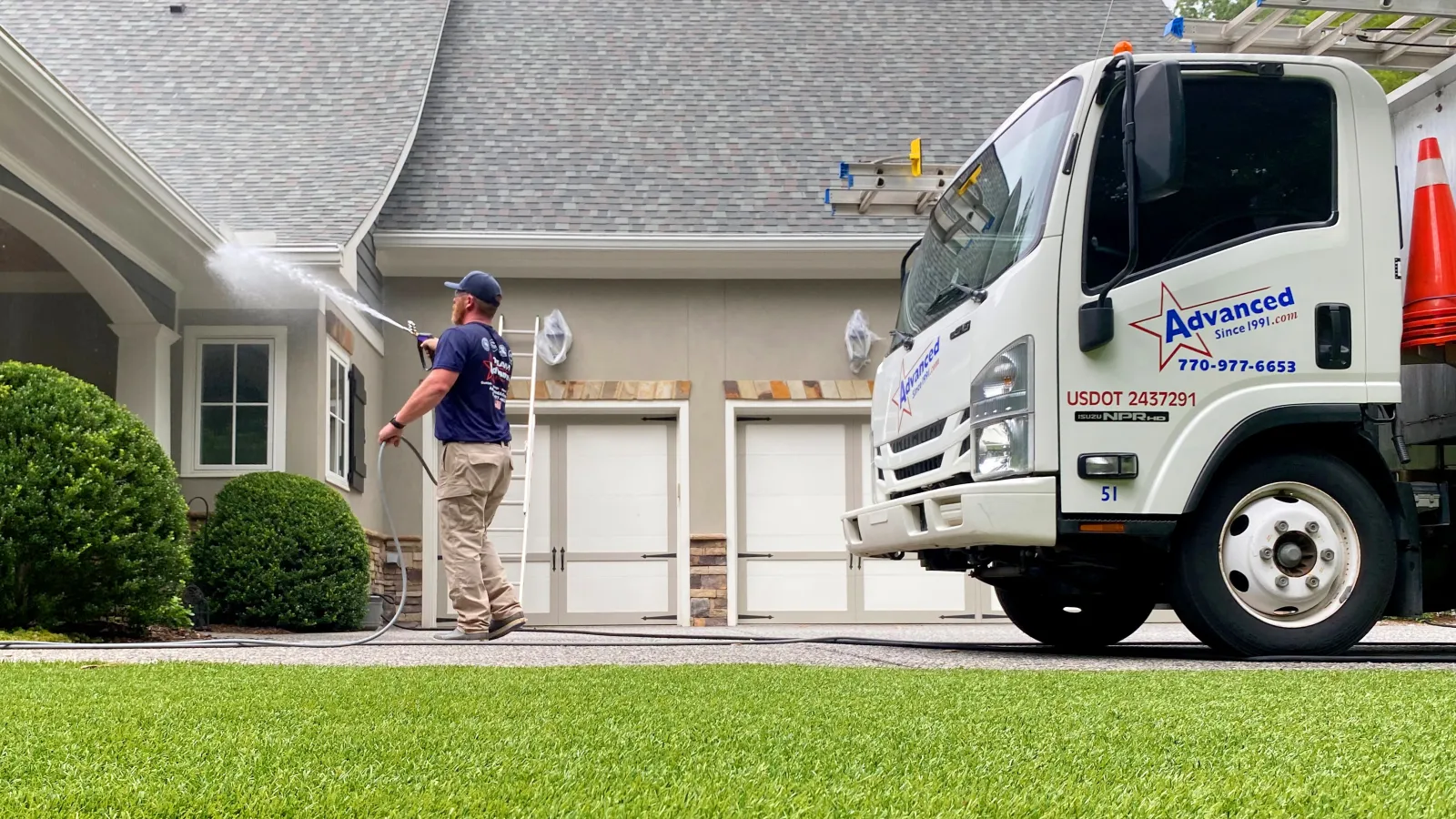 a person standing next to a truck