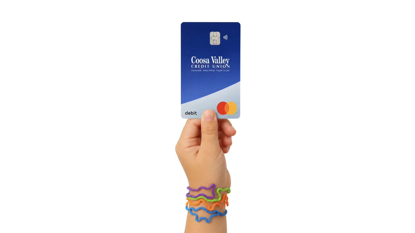 Hand holding Coosa Valley Credit Union debit card with colorful bracelets on wrist against white background
