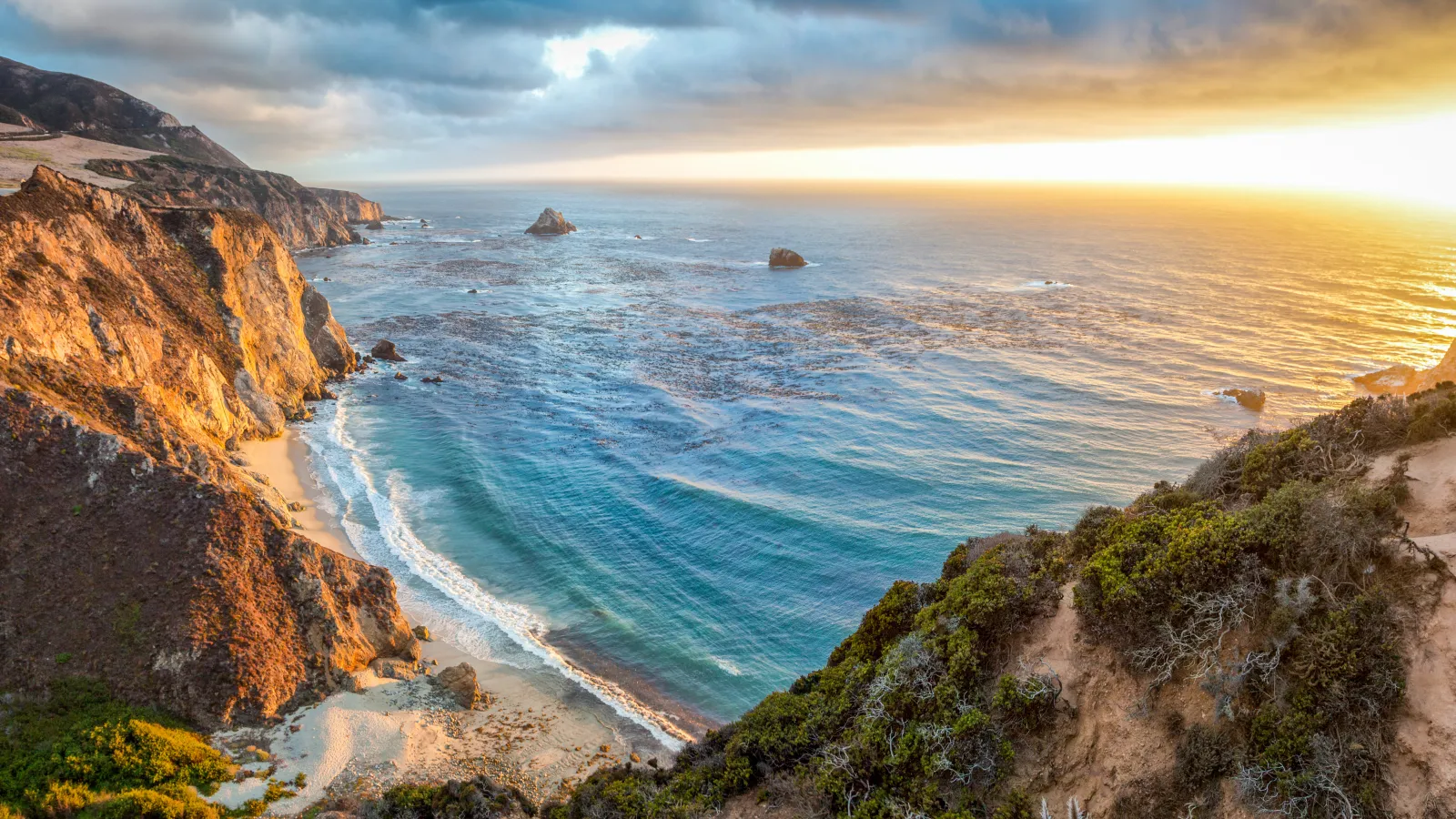 a beach with a body of water