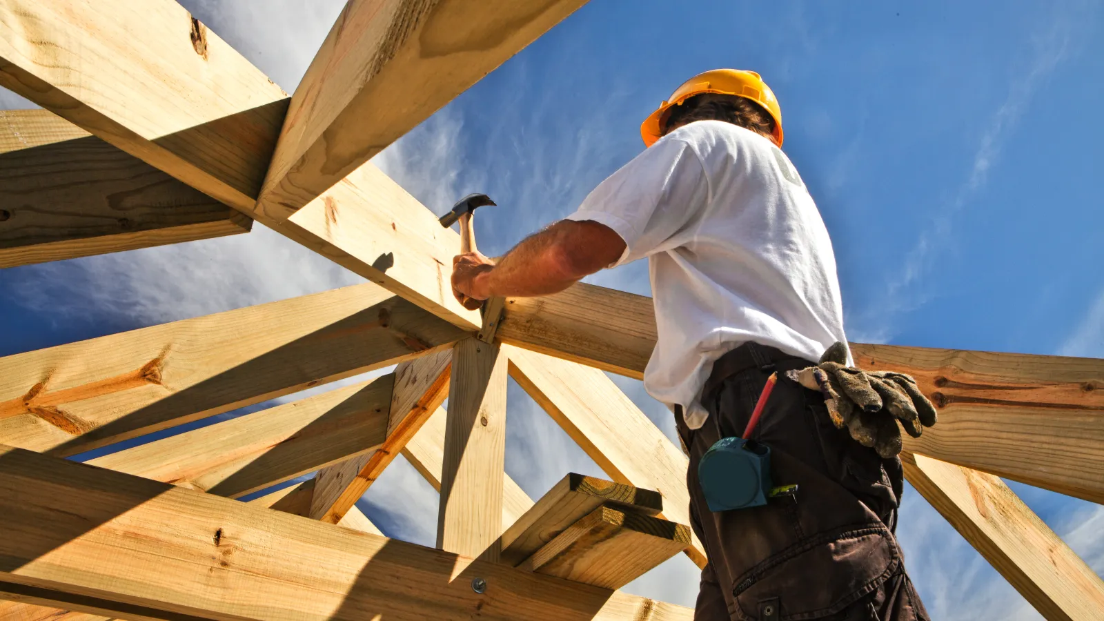 a person building a roof